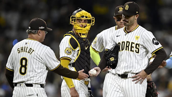 Oct 9, 2024; San Diego, California, USA; San Diego Padres manager Mike Shildt (8) takes out pitcher Dylan Cease (84) in the second inning against the Los Angeles Dodgers during game four of the NLDS for the 2024 MLB Playoffs at Petco Park. Mandatory Credit: Denis Poroy-Imagn Images Oct 9, 2024; San Diego, California, USA; San Diego Padres manager Mike Shildt (8) takes out pitcher Dylan Cease (84) in the second inning against the Los Angeles Dodgers during game four of the NLDS for the 2024 MLB Playoffs at Petco Park. Mandatory Credit: Denis Poroy-Imagn Images