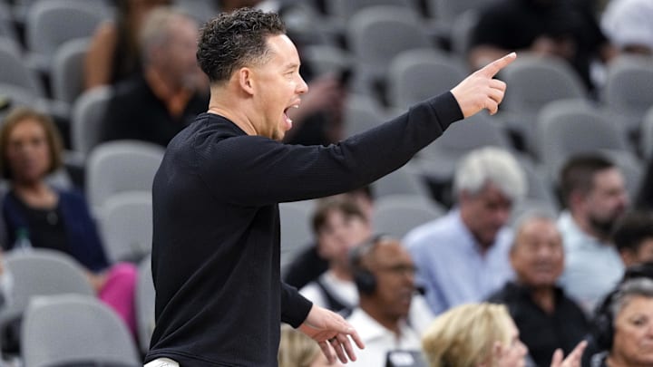 Nov 20, 2025; San Antonio, Texas, USA; San Antonio Spurs head coach Mitch Johnson signals to players during the first half against the Atlanta Hawks at Frost Bank Center. Mandatory Credit: Scott Wachter-Imagn Images Nov 20, 2025; San Antonio, Texas, USA; San Antonio Spurs head coach Mitch Johnson signals to players during the first half against the Atlanta Hawks at Frost Bank Center. Mandatory Credit: Scott Wachter-Imagn Images
