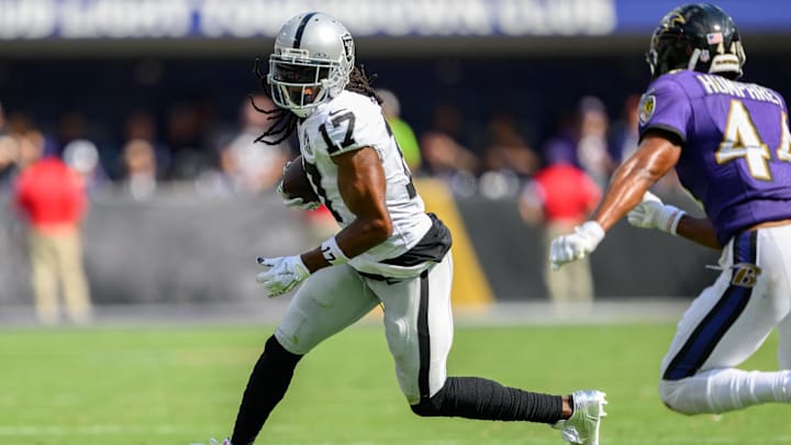 Sep 15, 2024; Baltimore, Maryland, USA; Las Vegas Raiders wide receiver Davante Adams (17) runs with the ball as Baltimore Ravens cornerback Marlon Humphrey (44) defends during the second half at M&T Bank Stadium. Mandatory Credit: Reggie Hildred-Imagn Images Sep 15, 2024; Baltimore, Maryland, USA; Las Vegas Raiders wide receiver Davante Adams (17) runs with the ball as Baltimore Ravens cornerback Marlon Humphrey (44) defends during the second half at M&T Bank Stadium. Mandatory Credit: Reggie Hildred-Imagn Images