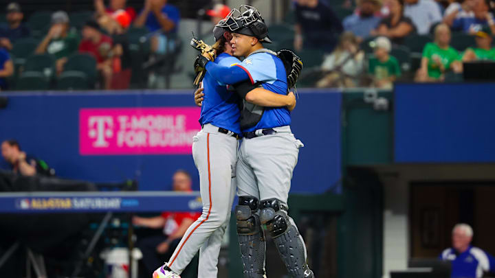 Jul 13, 2024; Arlington, TX, USA; National League Future  pitcher Bubba Chandler (l) hugs National League Future catcher Thayron Liranzo (r) after the game against the American League Future team during the Major league All-Star Futures game at Globe Life Field.