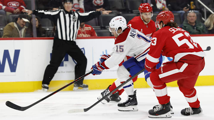 Jan 23, 2025; Detroit, Michigan, USA;  Montreal Canadiens center Alex Newhook (15) swp chased by Detroit Red Wings defenseman Moritz Seider (53) in the third period at Little Caesars Arena. Mandatory Credit: Rick Osentoski-Imagn Images