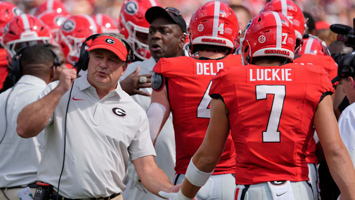 Georgia coach Kirby Smart celebrates with his team after a touchdown during the first half of a NCAA college football game against Marshall in Athens, Ga., on Saturday, August. 30, 2025.