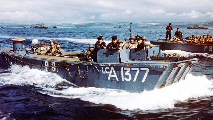 British Navy landing crafts carry U.S. troops to a ship in Southern England in preparation for D-Day.