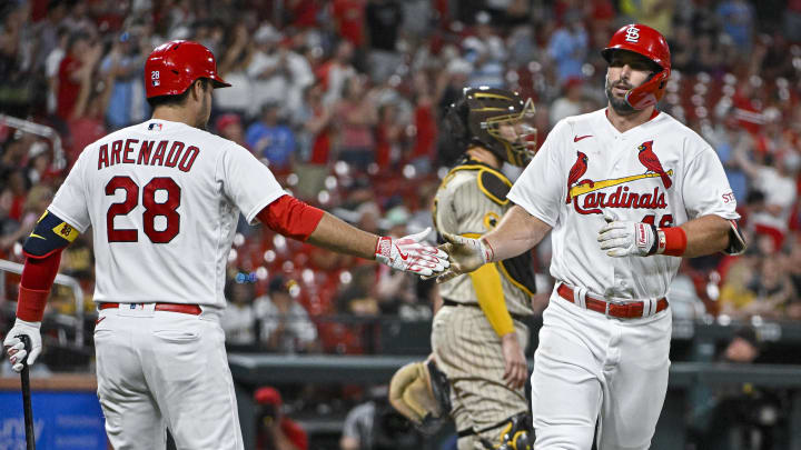 Aug 28, 2023; St. Louis, Missouri, USA;  St. Louis Cardinals first baseman Paul Goldschmidt (46) is congratulated by third baseman Nolan Arenado (28) after hitting a solo home run against the San Diego Padres during the eighth inning at Busch Stadium. Mandatory Credit: Jeff Curry-USA TODAY Sports