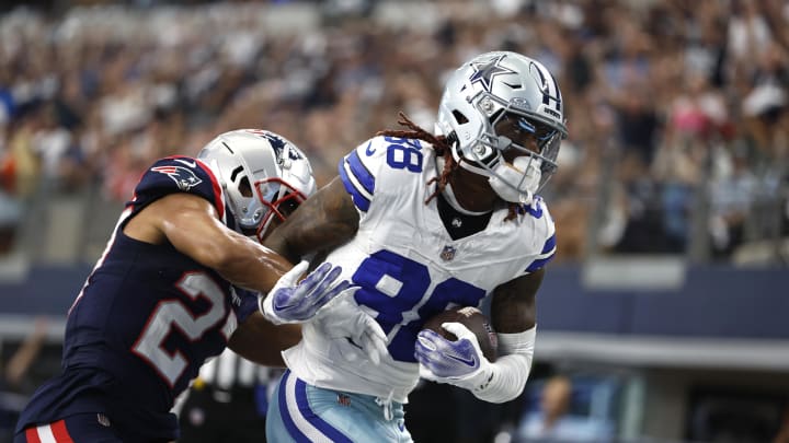 Oct 1, 2023; Arlington, Texas, USA; Dallas Cowboys wide receiver CeeDee Lamb (88) catches a touchdown pass against New England Patriots cornerback Myles Bryant (27) in the first quarter at AT&T Stadium. Mandatory Credit: Tim Heitman-USA TODAY Sports Oct 1, 2023; Arlington, Texas, USA; Dallas Cowboys wide receiver CeeDee Lamb (88) catches a touchdown pass against New England Patriots cornerback Myles Bryant (27) in the first quarter at AT&T Stadium. Mandatory Credit: Tim Heitman-USA TODAY Sports