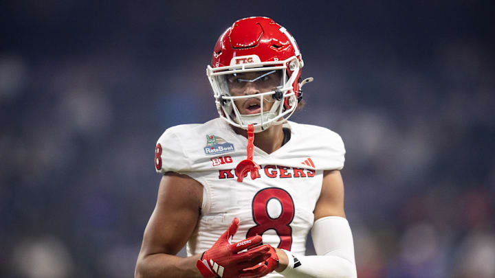Dec 26, 2024; Phoenix, AZ, USA; Rutgers Scarlet Knights wide receiver KJ Duff (8) against the Kansas State Wildcats during the Rate Bowl at Chase Field. Mandatory Credit: Mark J. Rebilas-Imagn Images Dec 26, 2024; Phoenix, AZ, USA; Rutgers Scarlet Knights wide receiver KJ Duff (8) against the Kansas State Wildcats during the Rate Bowl at Chase Field. Mandatory Credit: Mark J. Rebilas-Imagn Images