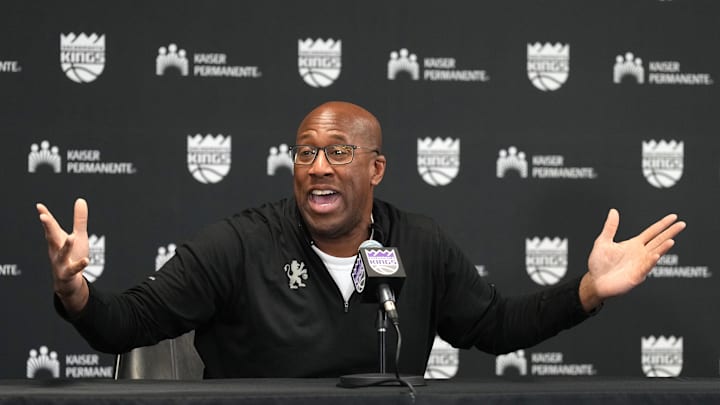 Dec 8, 2024; Sacramento, California, USA; Sacramento Kings head coach Mike Brown talks to media members before the game against the Utah Jazz at Golden 1 Center. Mandatory Credit: Darren Yamashita-Imagn Images