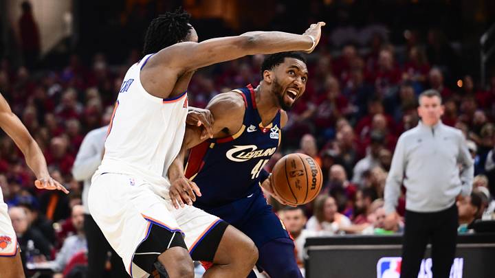 May 25, 2026; Cleveland, Ohio, USA; Cleveland Cavaliers guard Donovan Mitchell (45) drives the ball while defended by New York Knicks forward OG Anunoby (8) in the third quarter during game four of the eastern conference finals for the 2026 NBA playoffs at Rocket Arena. Mandatory Credit: Ken Blaze-Imagn Images