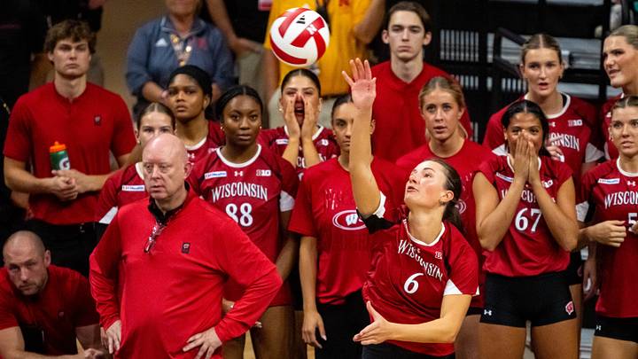 Oct 10, 2026; Lincoln, Nebraska, USA;  Wisconsin Badgers setter Isabelle Hoppe (6) sets against the Nebraska Cornhuskers during the first set at Bob Devaney Sport Center.  Mandatory Credit: Dylan Widger-Imagn Images