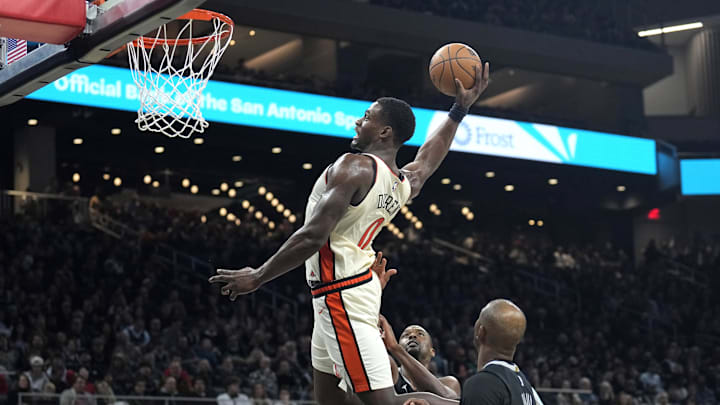 Feb 21, 2025; Austin, Texas, USA; Detroit Pistons center Jalen Duren (0) dunks: Scott Wachter-Imagn Images
