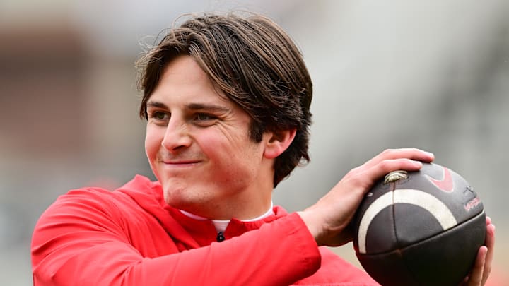 Nov 8, 2025; West Lafayette, Indiana, USA; Ohio State Buckeyes quarterback Julian Sayin (10) warms up before the game against the Purdue Boilermakers at Ross-Ade Stadium. Mandatory Credit: Marc Lebryk-Imagn Images Nov 8, 2025; West Lafayette, Indiana, USA; Ohio State Buckeyes quarterback Julian Sayin (10) warms up before the game against the Purdue Boilermakers at Ross-Ade Stadium. Mandatory Credit: Marc Lebryk-Imagn Images