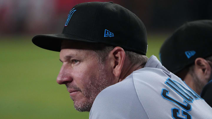 Jun 29, 2025; Phoenix, Arizona, USA; Miami Marlins manager Clayton McCullough (86) looks on against the Arizona Diamondbacks during the fifth inning at Chase Field. Mandatory Credit: Joe Camporeale-Imagn Images