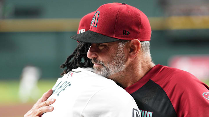 Jul 13, 2024; Phoenix, Arizona, USA; Arizona Diamondbacks manager Torey Lovullo (17) congratulates Arizona Diamondbacks second base Ketel Marte (4) on his selection to the MLB All-Star game prior the game against the Toronto Blue Jays at Chase Field. Mandatory Credit: Joe Camporeale-Imagn Images