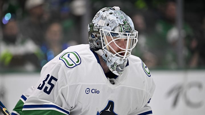 Jan 31, 2025; Dallas, Texas, USA; Vancouver Canucks goaltender Thatcher Demko (35) faces the Dallas Stars attack during the second period at the American Airlines Center. Mandatory Credit: Jerome Miron-Imagn Images