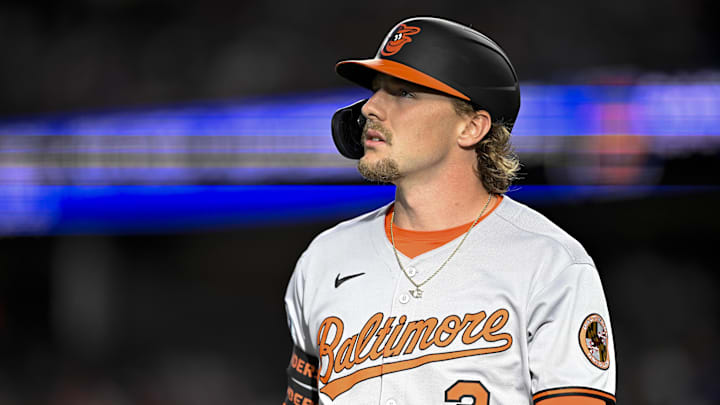 Jun 30, 2025; Arlington, Texas, USA; Baltimore Orioles shortstop Gunnar Henderson (2) walks off the field after striking out against the Texas Rangers during the first inning at Globe Life Field. Mandatory Credit: Jerome Miron-Imagn Images