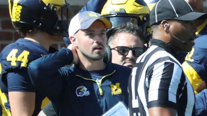 Michigan football analyst Connor Stalions stands on the sideline during the team's game against Rutgers, Sept. 23, 2023 at Michigan Stadium in Ann Arbor. Michigan football analyst Connor Stalions stands on the sideline during the team's game against Rutgers, Sept. 23, 2023 at Michigan Stadium in Ann Arbor.