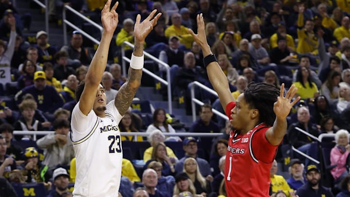 Dec 6, 2025; Ann Arbor, Michigan, USA; Michigan Wolverines forward Yaxel Lendeborg (23) shoots on Rutgers Scarlet Knights guard Jamichael Davis (1) in the first half at Crisler Center. Mandatory Credit: Rick Osentoski-Imagn Images Dec 6, 2025; Ann Arbor, Michigan, USA; Michigan Wolverines forward Yaxel Lendeborg (23) shoots on Rutgers Scarlet Knights guard Jamichael Davis (1) in the first half at Crisler Center. Mandatory Credit: Rick Osentoski-Imagn Images