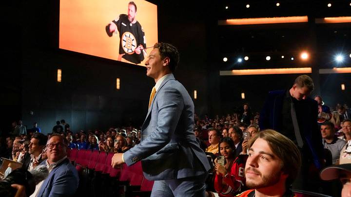 Jun 27, 2025; Los Angeles, California, USA; James Hagens is selected as the seventh overall pick to the Boston Bruins in the first round of the 2025 NHL Draft at Peacock Theater. Mandatory Credit: Kirby Lee-Imagn Images