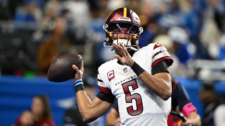 Washington Commanders quarterback Jayden Daniels (5) warms up prior to the game against Detroit Lions in a 2025 NFC divisional round game at Ford Field. 