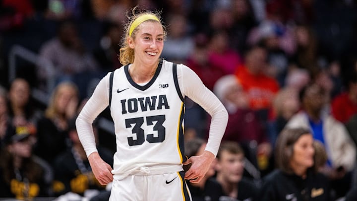 Iowa Hawkeyes guard Lucy Olsen (33) celebrates during a November 10, 2024 game.