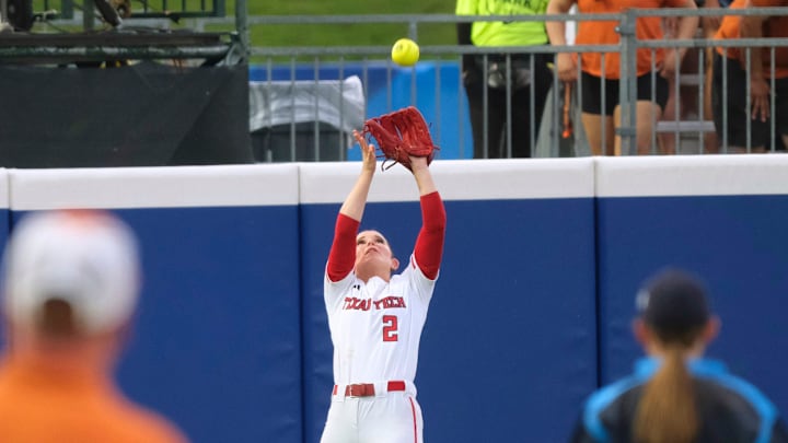 Texas Tech outfielder Demi Elder (2) catches a deep fly in Game 2 of the Women's College World Series championship series between the Texas Longhorns at Texas Tech Red Raiders at Devon Park in Oklahoma City, Thursday, June 5, 2025. Texas Tech won 4-3.