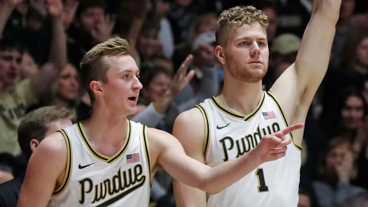 Purdue Boilermakers guard Fletcher Loyer (2) and forward Caleb Furst (1) celebrate Purdue Boilermakers guard Fletcher Loyer (2) and forward Caleb Furst (1) celebrate