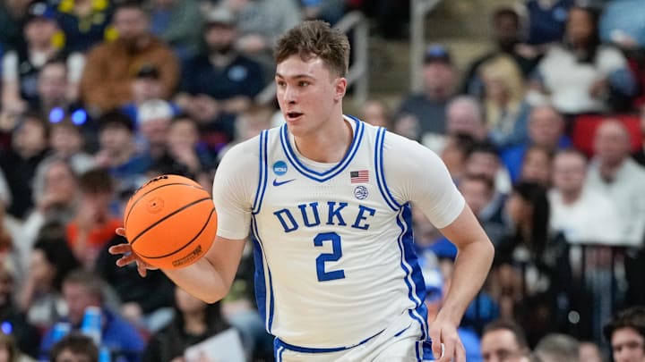 Mar 21, 2025; Raleigh, NC, USA; Duke Blue Devils forward Cooper Flagg (2) dribbles the ball against the Mount St. Mary's Mountaineers during the first half in the first round of the NCAA Tournament at Lenovo Center. Mandatory Credit: Bob Donnan-Imagn Images Mar 21, 2025; Raleigh, NC, USA; Duke Blue Devils forward Cooper Flagg (2) dribbles the ball against the Mount St. Mary's Mountaineers during the first half in the first round of the NCAA Tournament at Lenovo Center. Mandatory Credit: Bob Donnan-Imagn Images