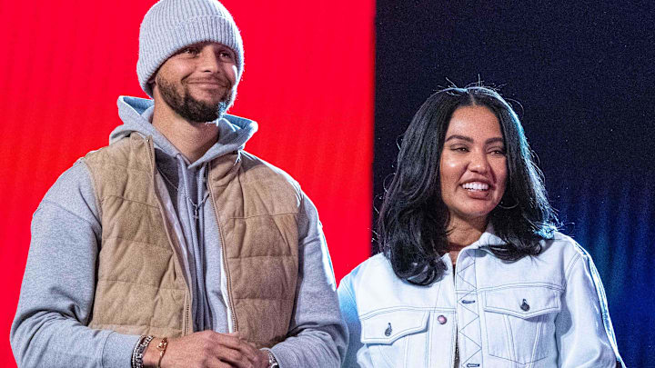 Golden State Warriors guard Stephen Curry (30) and wife Ayesha Curry (right) during the 2022 NBA All-Star Saturday Night at Rocket Mortgage Field House. 