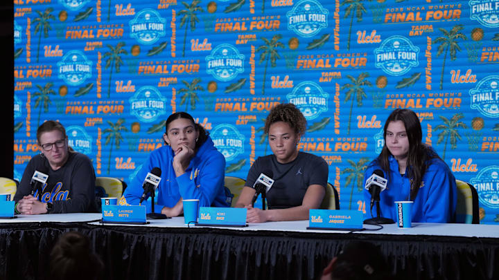 Apr 3, 2025; Tampa, FL, USA; From left: UCLA Bruins head coach Cori Close, center Lauren Betts, guard Kiki Rice and guard Gabriela Jaquez during press conference at Amalie Arena. Mandatory Credit: Kirby Lee-Imagn Images
