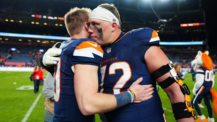 Dec 2, 2024; Denver, Colorado, USA; Denver Broncos offensive tackle Garett Bolles (72) hugs quarterback Bo Nix (10) following the win against the Cleveland Browns at Empower Field at Mile High. Dec 2, 2024; Denver, Colorado, USA; Denver Broncos offensive tackle Garett Bolles (72) hugs quarterback Bo Nix (10) following the win against the Cleveland Browns at Empower Field at Mile High.
