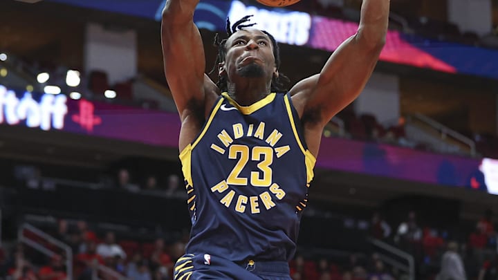 Oct 10, 2023; Houston, Texas, USA; Indiana Pacers forward Aaron Nesmith (23) dunks the ball during the third quarter against the Houston Rockets at Toyota Center. Mandatory Credit: Troy Taormina-Imagn Images