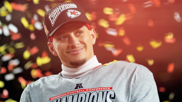 Jan 26, 2025; Kansas City, MO, USA; Confetti falls as Kansas City Chiefs quarterback Patrick Mahomes celebrates after defeating the Buffalo Bills during the AFC Championship game at GEHA Field at Arrowhead Stadium. Mandatory Credit: Mark J. Rebilas-Imagn Images