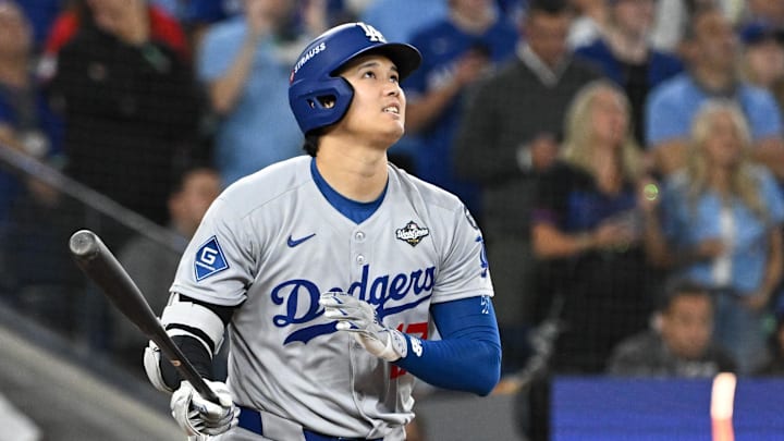 Oct 24, 2025 Dodgers designated hitter Shohei Ohtani hits a two-run home run against the Blue Jays during Game 1 of the 2025 MLB World Series. Oct 24, 2025 Dodgers designated hitter Shohei Ohtani hits a two-run home run against the Blue Jays during Game 1 of the 2025 MLB World Series.