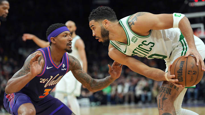 Mar 9, 2024; Phoenix, Arizona, USA; Phoenix Suns guard Bradley Beal (3) guards Boston Celtics forward Jayson Tatum (0) during the second half at Footprint Center. Mandatory Credit: Joe Camporeale-Imagn Images