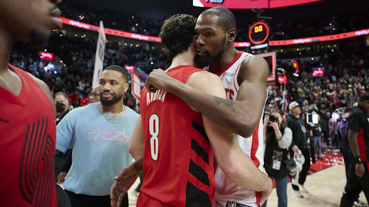 Jan 9, 2026; Portland, Oregon, USA; Houston Rockets forward Kevin Durant (7) embraces Portland Trail Blazers forward Deni Avdija (8) after a game at Moda Center. Mandatory Credit: Troy Wayrynen-Imagn Images Jan 9, 2026; Portland, Oregon, USA; Houston Rockets forward Kevin Durant (7) embraces Portland Trail Blazers forward Deni Avdija (8) after a game at Moda Center. Mandatory Credit: Troy Wayrynen-Imagn Images