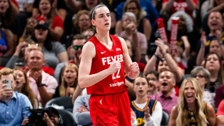 Indiana Fever guard Caitlin Clark (22) celebrates scoring Saturday, July 6, 2024, during the game at Gainbridge Fieldhouse in Indianapolis.