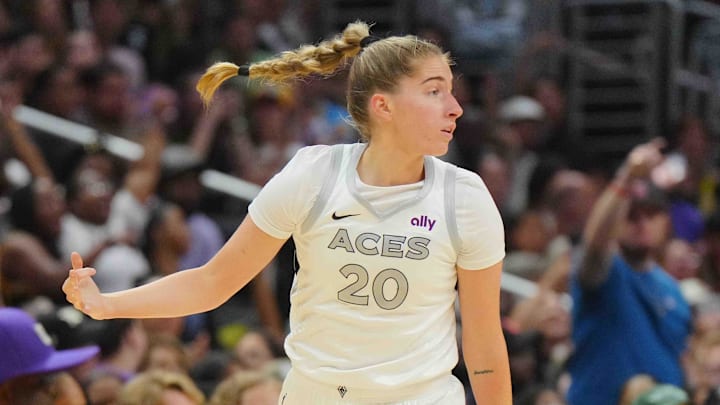 Jul 5, 2024; Los Angeles, California, USA; Las Vegas Aces guard Kate Martin (20) gestures after a three-point basket in the first half against the LA Sparks at Crypto.com Arena. Mandatory Credit: Kirby Lee-Imagn Images