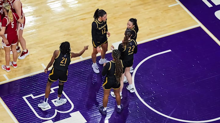 Northwestern Wildcats women's basketball players huddle during a game against the Nebraska Cornhuskers on March 2, 2025. Northwestern Wildcats women's basketball players huddle during a game against the Nebraska Cornhuskers on March 2, 2025.