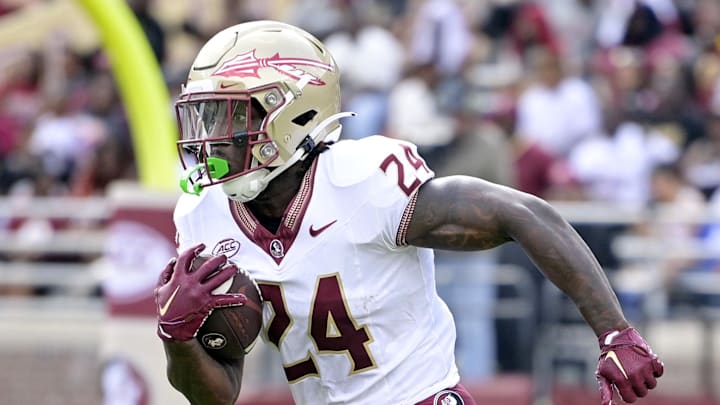 Apr 20, 2024; Tallahassee, Florida, USA; Florida State Seminoles running back Roydell Williams (24) runs the ball during the Spring Showcase at Doak S. Campbell Stadium. Mandatory Credit: Melina Myers-Imagn Images