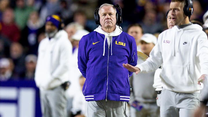 Nov 30, 2024; Baton Rouge, Louisiana, USA; LSU Tigers head coach Brian Kelly looks on against the Oklahoma Sooners during the second quarter at Tiger Stadium. Mandatory Credit: Stephen Lew-Imagn Images Nov 30, 2024; Baton Rouge, Louisiana, USA; LSU Tigers head coach Brian Kelly looks on against the Oklahoma Sooners during the second quarter at Tiger Stadium. Mandatory Credit: Stephen Lew-Imagn Images