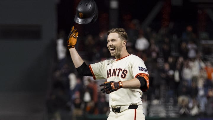 Jun 10, 2024; San Francisco, California, USA; San Francisco Giants pinch hitter Austin Slater (13) reacts after hitting a walk-off RBI single.