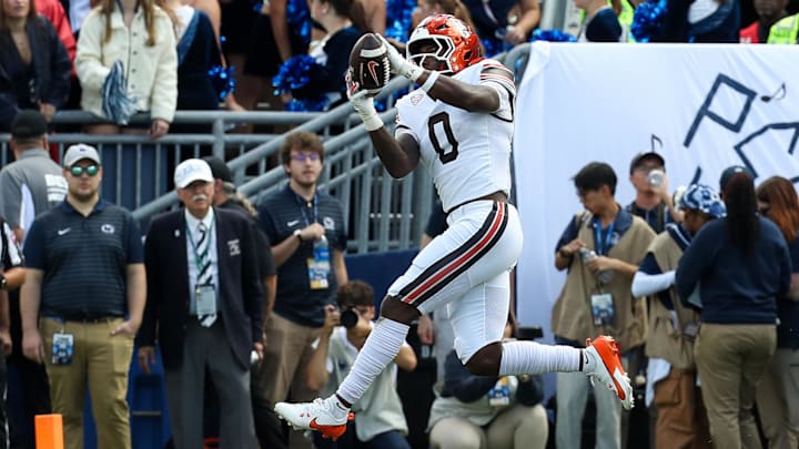 Sep 7, 2024; University Park, Pennsylvania, USA; Bowling Green Falcons tight end Harold Fannin Jr (0) makes a touchdown catch during the first quarter against the Penn State Nittany Lions at Beaver Stadium. Mandatory Credit: Matthew O'Haren-Imagn Images