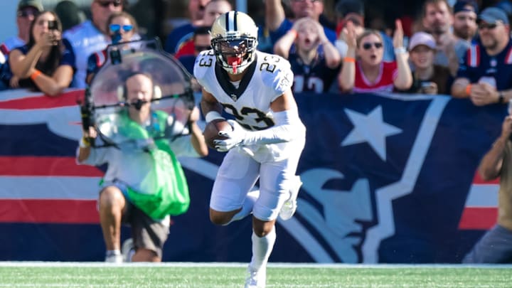 New Orleans Saints cornerback Marshon Lattimore (23) intercepts a pass against New England Patriots