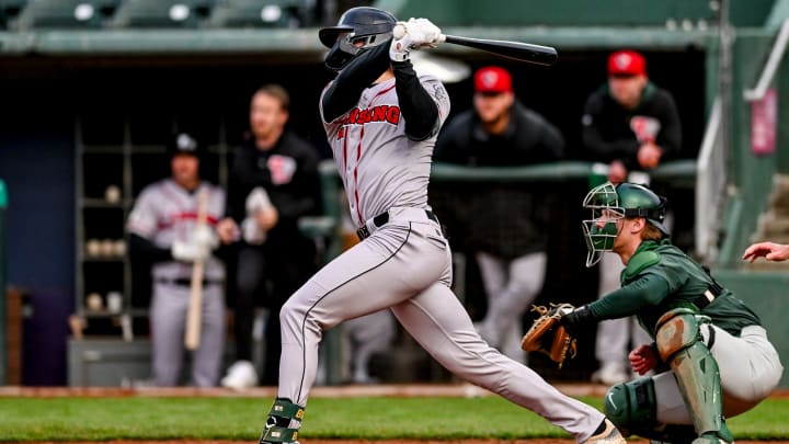Lugnuts' Henry Bolte hits a home run against Michigan State in the fourth inning on Wednesday, April 3, 2024, during the Crosstown Showdown at Jackson Field in Lansing. Lugnuts' Henry Bolte hits a home run against Michigan State in the fourth inning on Wednesday, April 3, 2024, during the Crosstown Showdown at Jackson Field in Lansing.