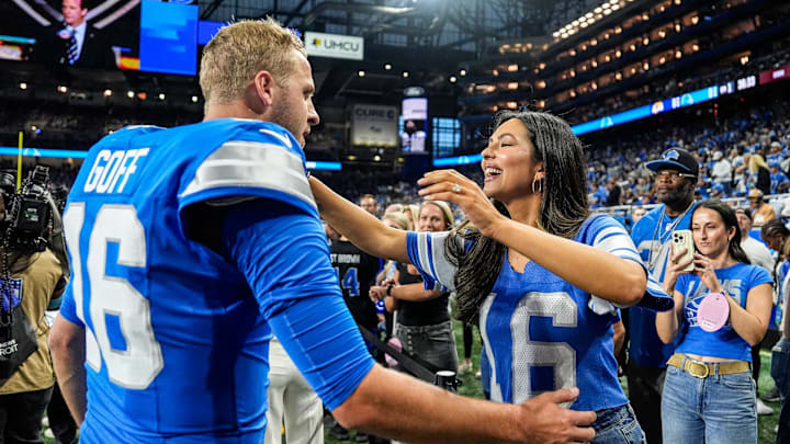 Detroit Lions quarterback Jared Goff hugs his wife Christen Harper during warmups before the season opener against the Los Angeles Rams at Ford Field in Detroit on Sunday, Sept. 8, 2024. The two were married in June 2024.