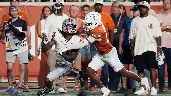 Ohio State Buckeyes wide receiver Jeremiah Smith (4) cannot make a catch against Texas Longhorns defensive back Bo Mascoe (5) during the second half at Darrell K Royal-Texas Memorial Stadium. Ohio State Buckeyes wide receiver Jeremiah Smith (4) cannot make a catch against Texas Longhorns defensive back Bo Mascoe (5) during the second half at Darrell K Royal-Texas Memorial Stadium.