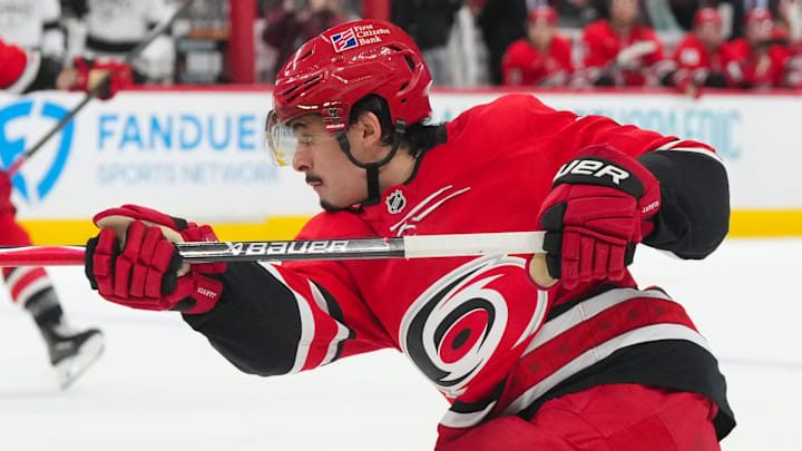 Feb 1, 2026; Raleigh, North Carolina, USA; Carolina Hurricanes center Seth Jarvis (24) takes a shot against the Los Angeles Kings during the third period at Lenovo Center. Mandatory Credit: James Guillory-Imagn Images