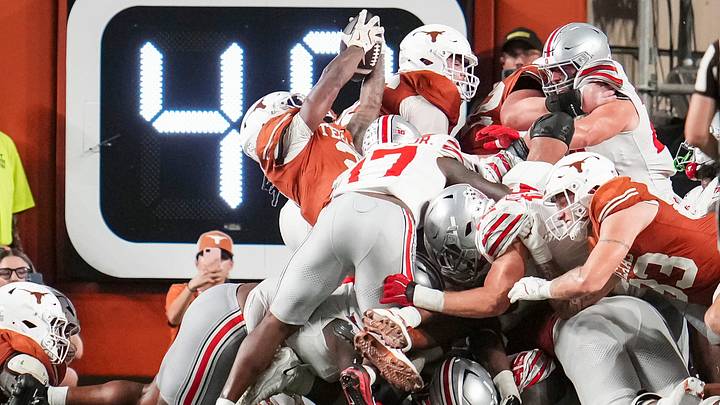 Texas Longhorns running back Hollywood Smothers (2) scores the game winning touchdown during the NCAA football game against the Ohio State Buckeyes at Darrell K Royal–Texas Memorial Stadium in Austin, Texas on Sept. 12, 2026. Texas won 24-23. Texas Longhorns running back Hollywood Smothers (2) scores the game winning touchdown during the NCAA football game against the Ohio State Buckeyes at Darrell K Royal–Texas Memorial Stadium in Austin, Texas on Sept. 12, 2026. Texas won 24-23.