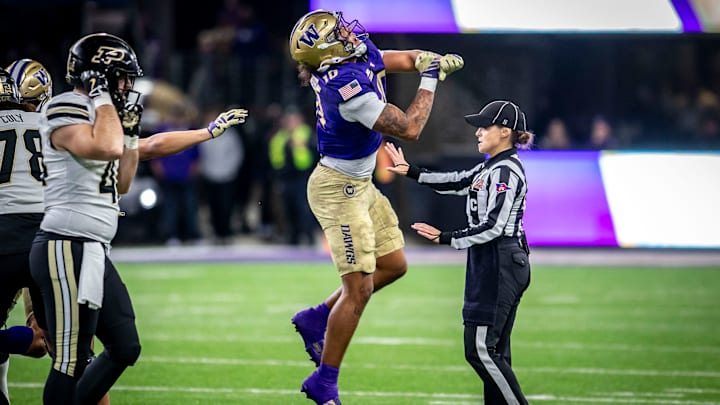 An exuberant Xe'ree Alexander almost runs into a game official. An exuberant Xe'ree Alexander almost runs into a game official.