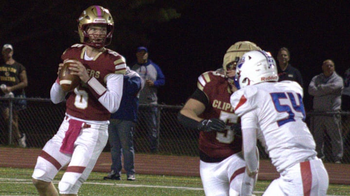 Portsmouth/Oyster River quarterback Andy Brown tossed three touchdown passes in a 26-13 upset of Winnacunnet